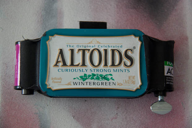 Back of a pinhole camera made from an Altoids mints tin box