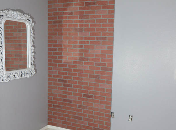 How to mount a faux brick wall panel