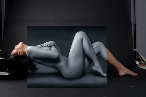 Combined photo of an unedited boudoir photo with an edited nude photo