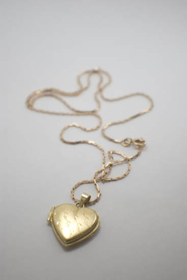 Golden heart Lockett on a gold chain