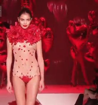 Beautiful female model posing in Zahia couture lingerie fashion show 