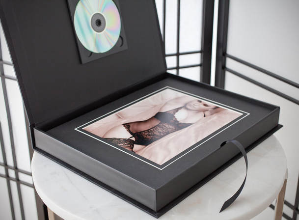 CD and high quality matted portraits inside a beautiful hand made folio box. Perfect for your boudoir photo shoot.