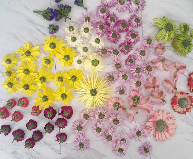 Yes, you need to use real flowers when taking milk bath photos. Fake flowers sink