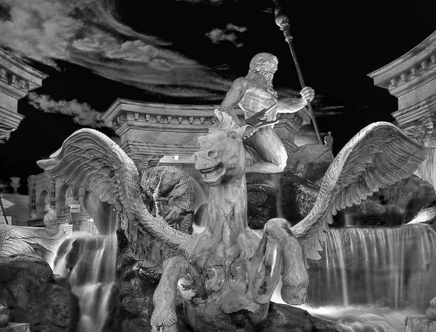 Zeus Greek God of Sky, Lightning, and Thunder Statue located in the Forum Shops at Caesars Palace Hotel and Casino in Las Vegas